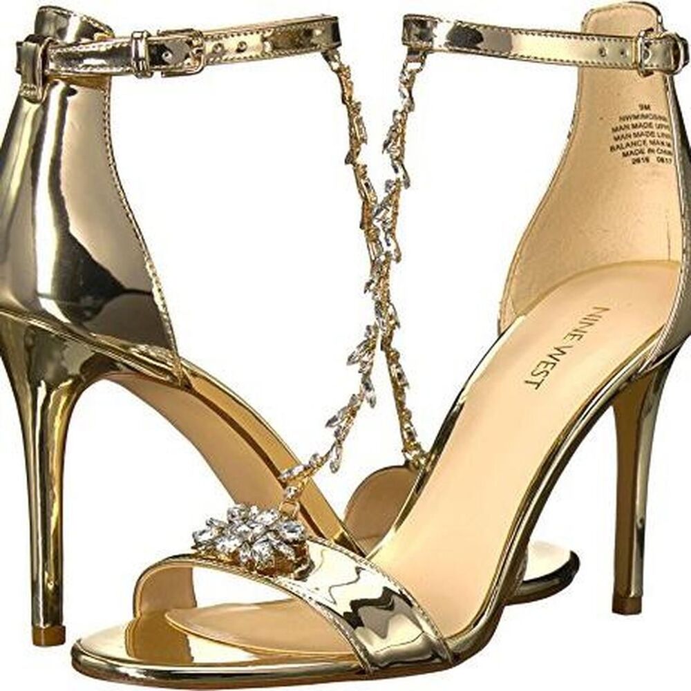 Nine West Mimosina gold metallic heeled sandals with detailed flower chain.